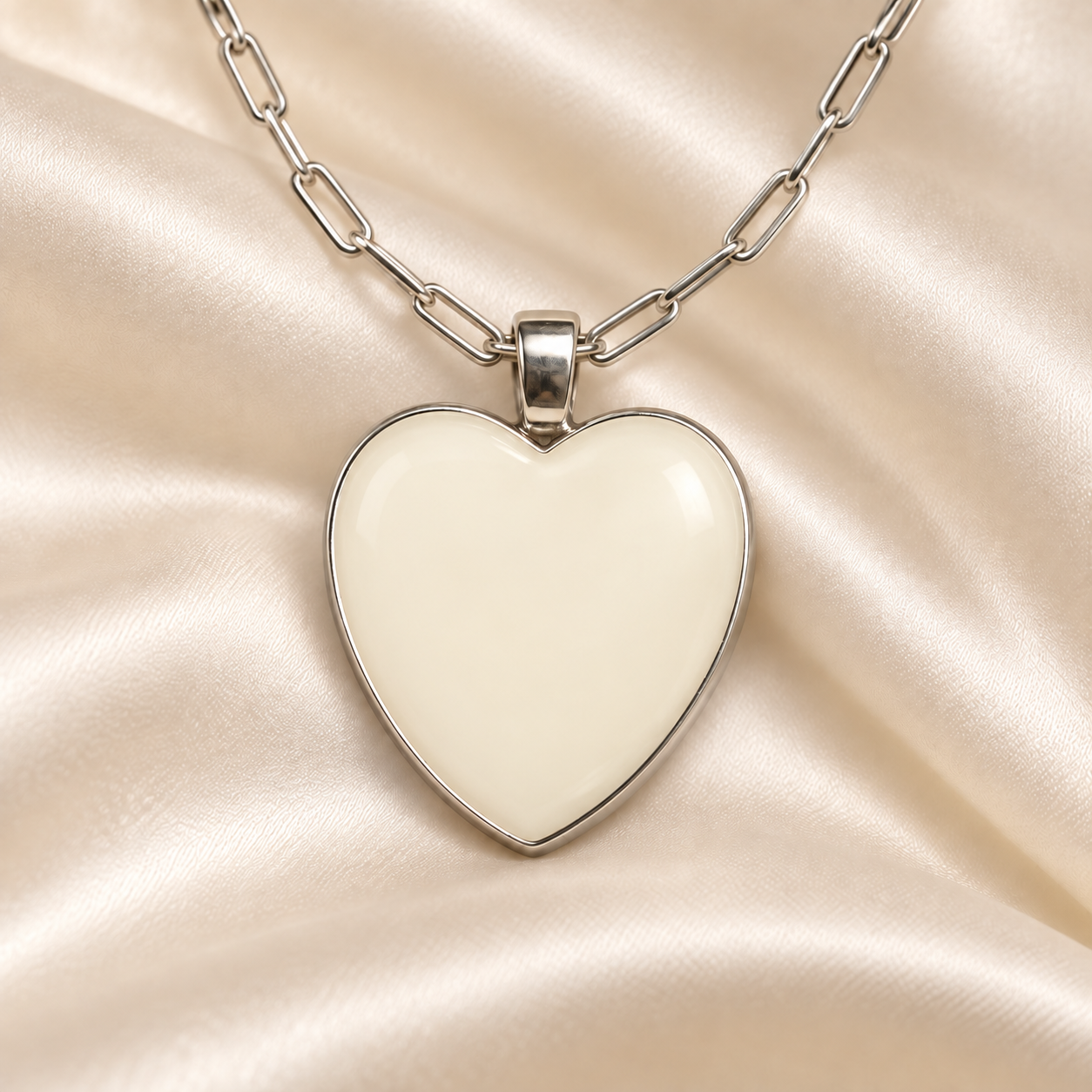 Natural Milk finish reference illustrated on a heart pendant