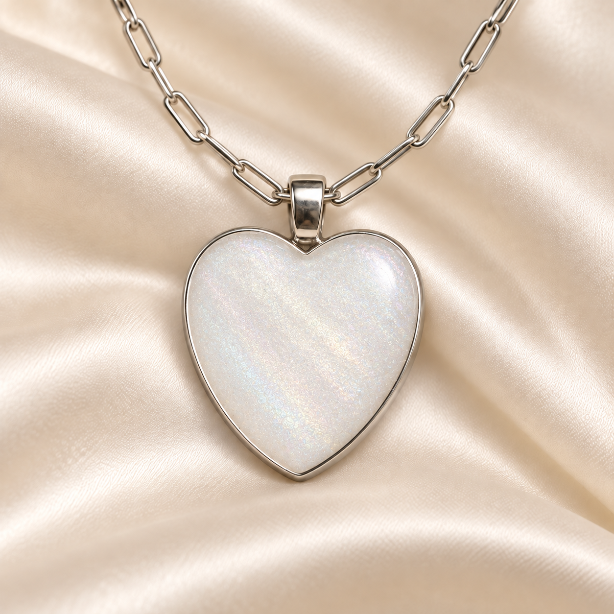 Opalescent Shimmer finish reference illustrated on a heart pendant