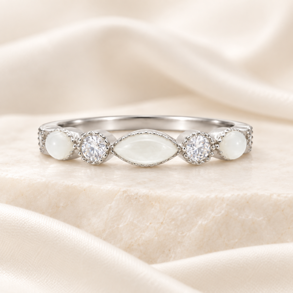 Design illustration of a sterling silver band ring with three Mother’s Milk inlays